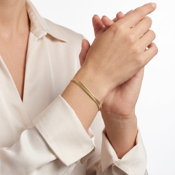 Serpent Glide Herringbone Bracelet – 18K Gold hover